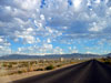 Morning fluffy clouds over Nellis.  How nice.